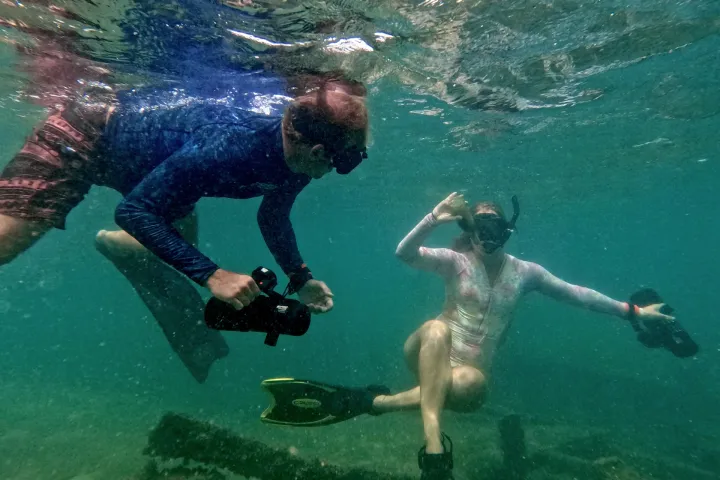 a man swimming in the water