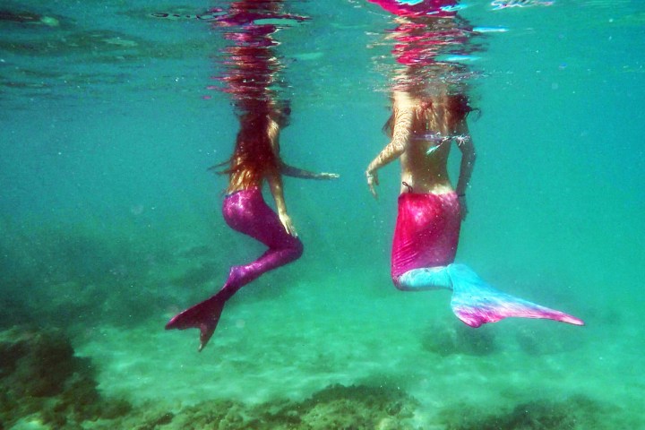a person swimming in a body of water