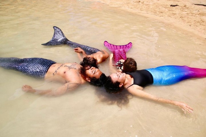 a person lying in a pool of water